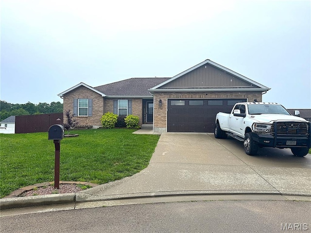 716 Greenfield Ct, Farmington, MO 63640 - single story home featuring an attached garage, driveway, brick siding, and a front lawn