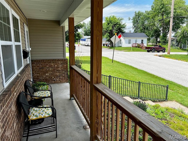 320 N Dickerson St, Palmyra, MO 63461 - porch featuring a yard
