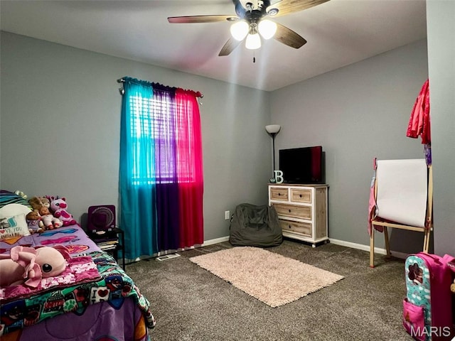 320 N Dickerson St, Palmyra, MO 63461 - carpeted bedroom featuring ceiling fan and baseboards