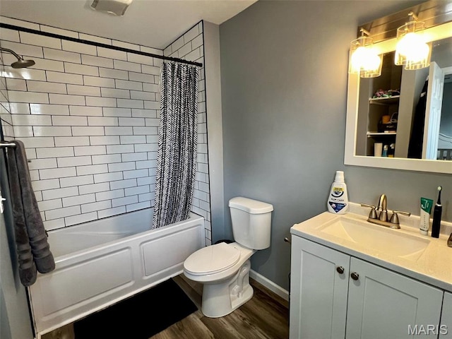 320 N Dickerson St, Palmyra, MO 63461 - bathroom featuring vanity, shower / bathtub combination with curtain, and wood finished floors