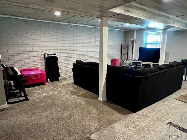 320 N Dickerson St, Palmyra, MO 63461 - living area with brick wall and carpet flooring
