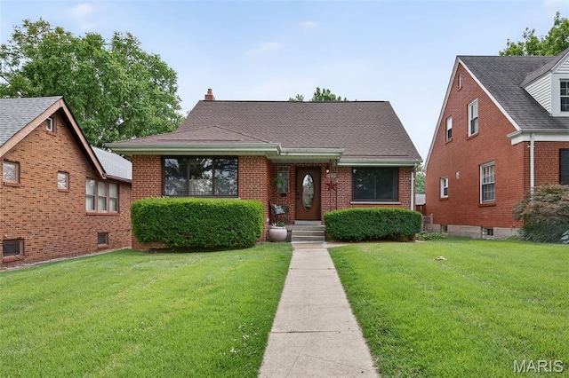 6580 Oleatha Ave, Saint Louis, MO 63139 - bungalow-style home with a front yard and brick siding