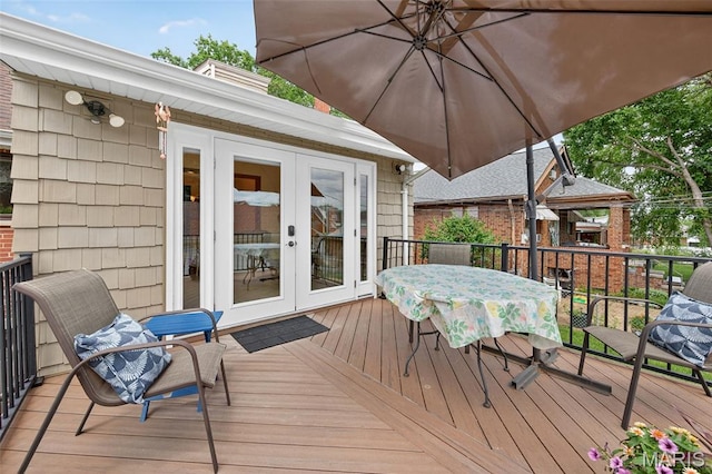 6580 Oleatha Ave, Saint Louis, MO 63139 - deck featuring french doors and outdoor dining area