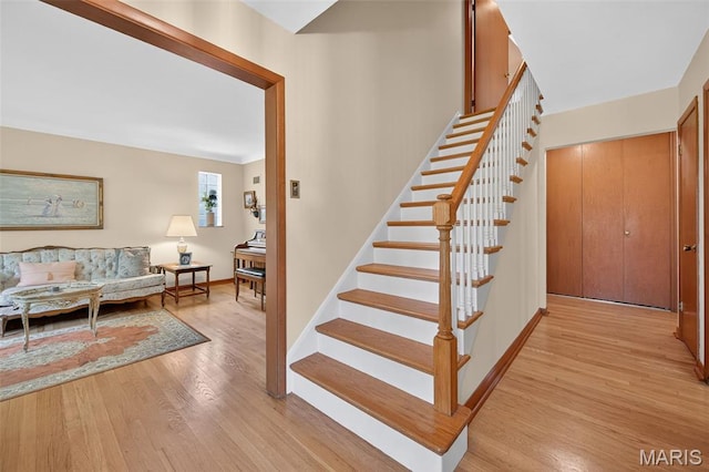 6580 Oleatha Ave, Saint Louis, MO 63139 - stairway with wood finished floors and baseboards