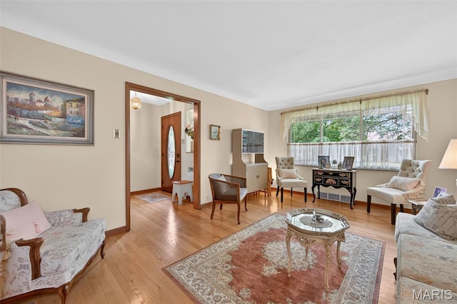 6580 Oleatha Ave, Saint Louis, MO 63139 - living area with light wood-style flooring