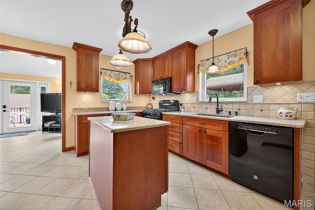 6580 Oleatha Ave, Saint Louis, MO 63139 - kitchen featuring black appliances, light tile patterned floors, backsplash, and plenty of natural light