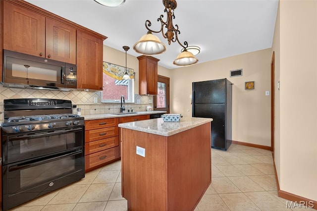 6580 Oleatha Ave, Saint Louis, MO 63139 - kitchen with black appliances, backsplash, a center island, and brown cabinetry
