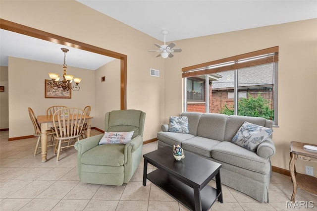 6580 Oleatha Ave, Saint Louis, MO 63139 - living room with a chandelier, light tile patterned flooring, and ceiling fan