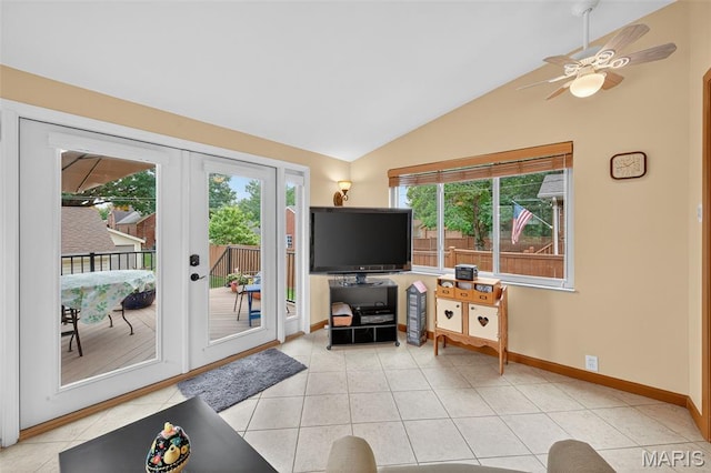 6580 Oleatha Ave, Saint Louis, MO 63139 - living room with healthy amount of natural light, lofted ceiling, light tile patterned floors, ceiling fan, and french doors