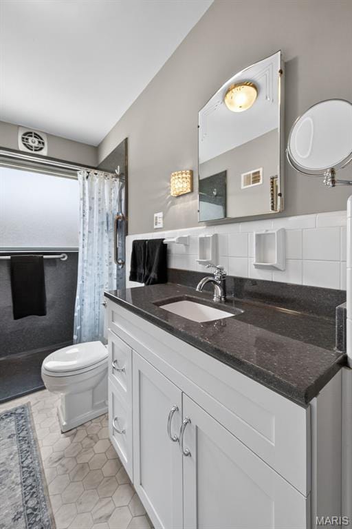 6580 Oleatha Ave, Saint Louis, MO 63139 - full bath with vanity, tile patterned flooring, and a shower with curtain