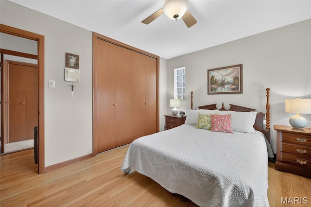 6580 Oleatha Ave, Saint Louis, MO 63139 - bedroom with a closet, light wood-style floors, and ceiling fan