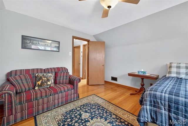 6580 Oleatha Ave, Saint Louis, MO 63139 - bedroom with vaulted ceiling, wood finished floors, and ceiling fan