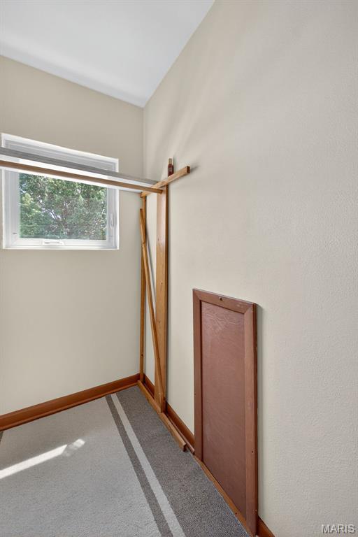6580 Oleatha Ave, Saint Louis, MO 63139 - carpeted spare room with baseboards