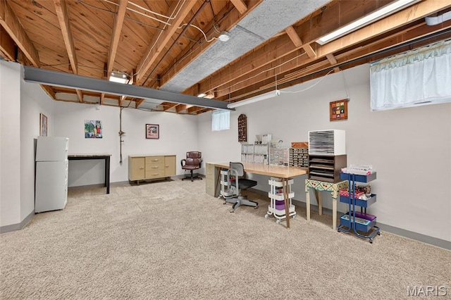 6580 Oleatha Ave, Saint Louis, MO 63139 - below grade area with freestanding refrigerator, an office area, and carpet floors