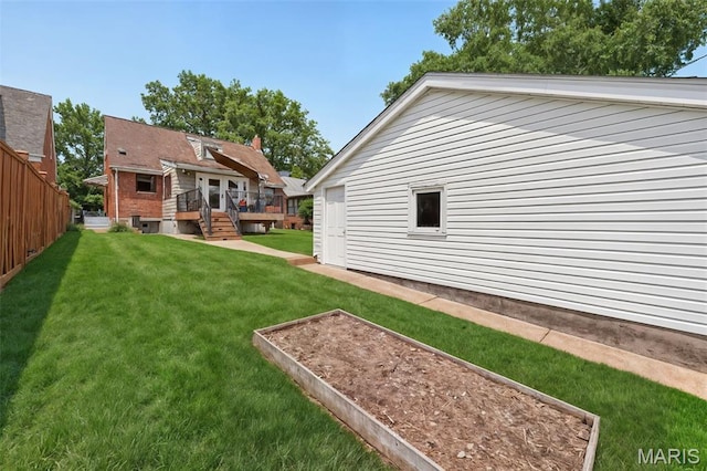 6580 Oleatha Ave, Saint Louis, MO 63139 - view of yard with a garden and a deck