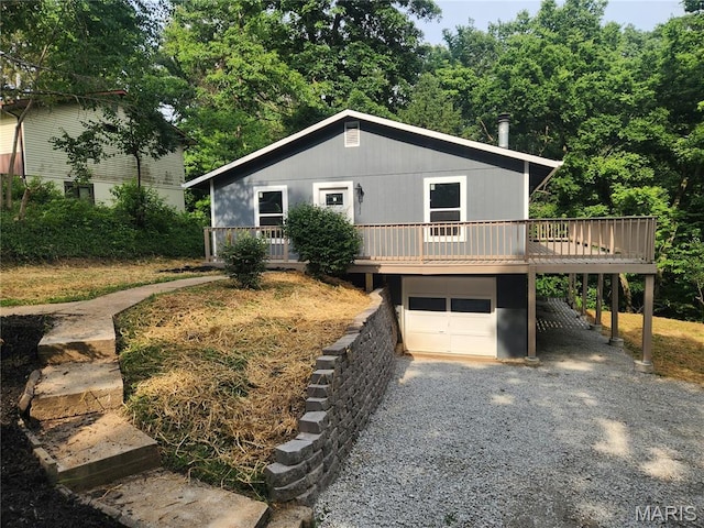 522 Judith Ann Pl, Fairview Heights, IL 62208 - view of front of property with a garage, a wooden deck, and driveway