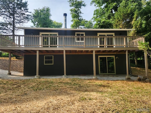 522 Judith Ann Pl, Fairview Heights, IL 62208 - back of house featuring a deck, a patio area, and a lawn