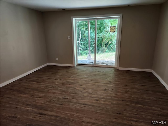 522 Judith Ann Pl, Fairview Heights, IL 62208 - empty room with baseboards and dark wood-type flooring
