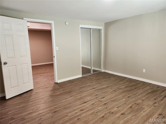 522 Judith Ann Pl, Fairview Heights, IL 62208 - unfurnished bedroom featuring wood finished floors and a closet