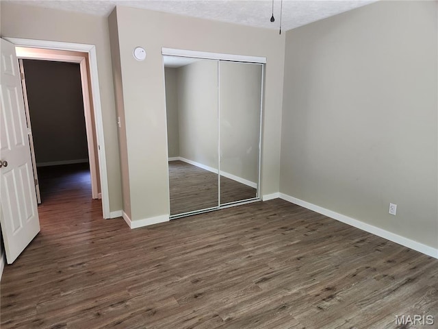 522 Judith Ann Pl, Fairview Heights, IL 62208 - unfurnished bedroom with a closet and wood finished floors