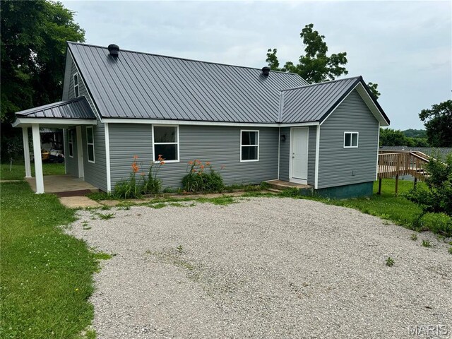 401 Clara St, Potosi, MO 63664 - rear view of house with a metal roof