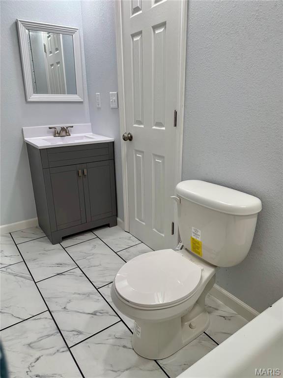 401 Clara St, Potosi, MO 63664 - half bathroom with marble finish floors and vanity