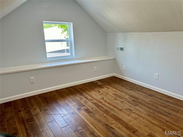 401 Clara St, Potosi, MO 63664 - additional living space featuring hardwood / wood-style floors and vaulted ceiling