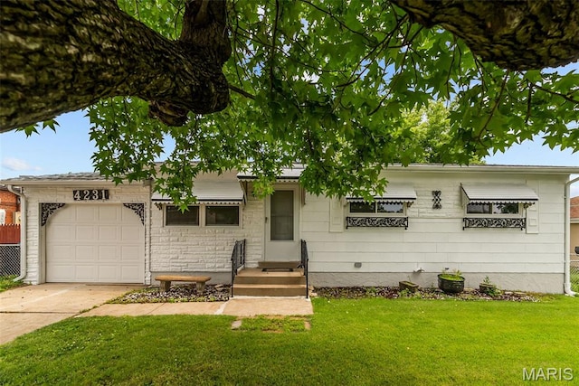 4231 Green Park Rd, Saint Louis, MO 63125 - view of front facade with an attached garage, a front lawn, and driveway