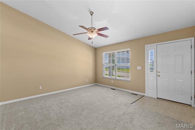925 Stone Crossing Dr, Wentzville, MO 63385 - foyer featuring light carpet, a ceiling fan, and vaulted ceiling