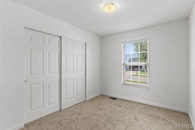 925 Stone Crossing Dr, Wentzville, MO 63385 - unfurnished bedroom featuring carpet floors and a closet