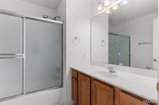 925 Stone Crossing Dr, Wentzville, MO 63385 - bathroom featuring vanity and shower / bath combination with glass door