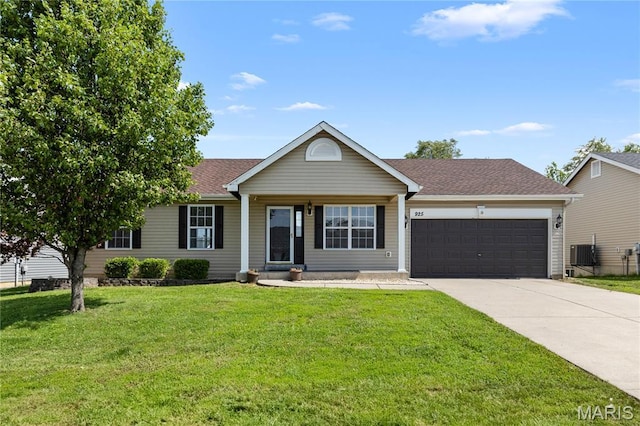925 Stone Crossing Dr, Wentzville, MO 63385 - single story home with an attached garage, concrete driveway, a front yard, covered porch, and a shingled roof