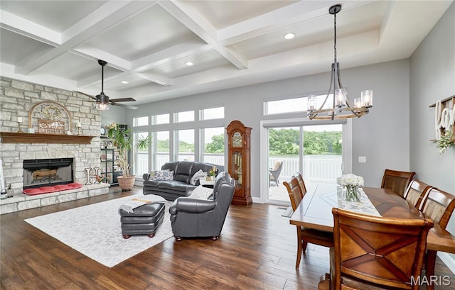 10234 Village Dr, Foristell, MO 63348 - living area with ceiling fan, dark wood-type flooring, a chandelier, beamed ceiling, and coffered ceiling
