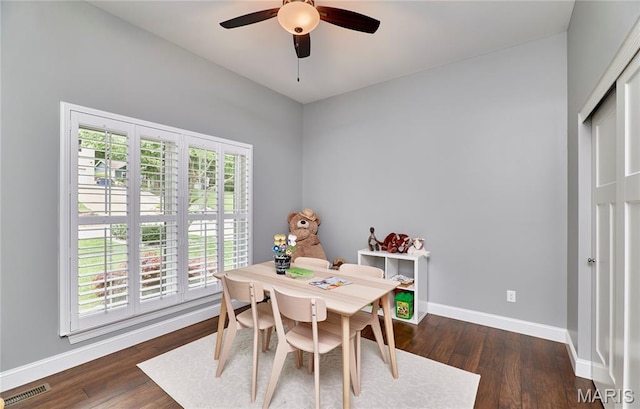 10234 Village Dr, Foristell, MO 63348 - dining area with a ceiling fan and wood finished floors