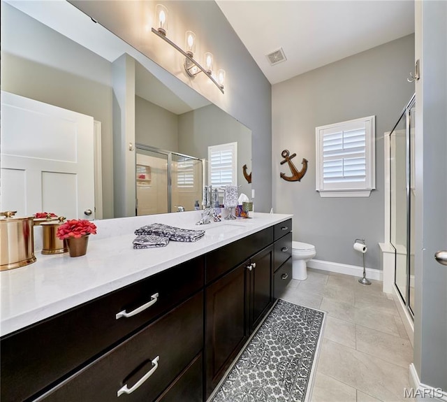 10234 Village Dr, Foristell, MO 63348 - bathroom featuring vanity, a stall shower, and tile patterned floors