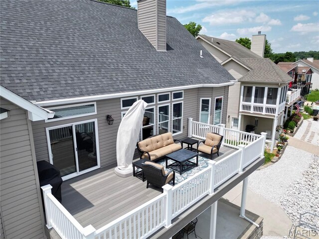 10234 Village Dr, Foristell, MO 63348 - wooden terrace with outdoor lounge area