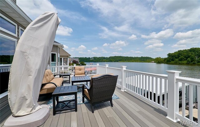 10234 Village Dr, Foristell, MO 63348 - deck featuring a water view and an outdoor hangout area
