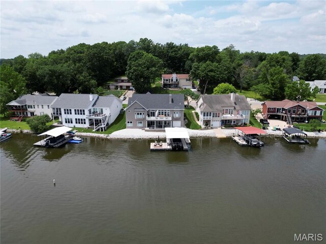 10234 Village Dr, Foristell, MO 63348 - aerial view of residential area with a large body of water