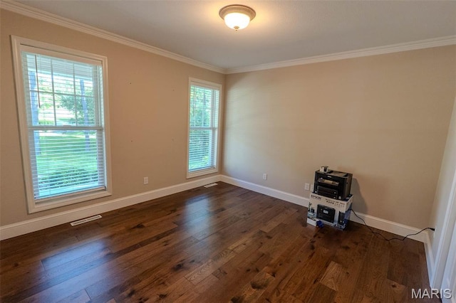 11782 Pine Forest Dr, Rolla, MO 65401 - empty room featuring crown molding and dark wood-type flooring