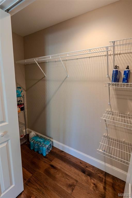 11782 Pine Forest Dr, Rolla, MO 65401 - spacious closet featuring wood finished floors