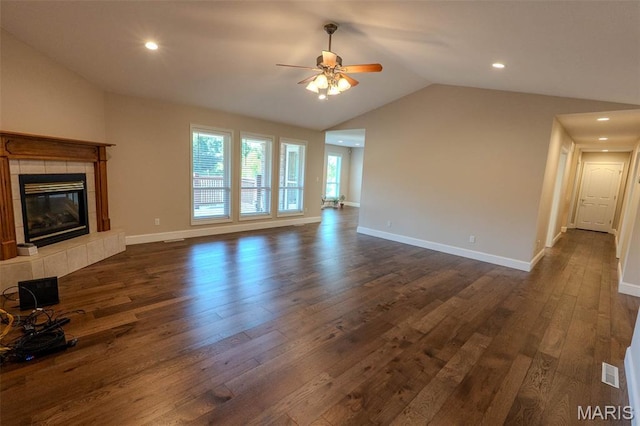 11782 Pine Forest Dr, Rolla, MO 65401 - unfurnished living room with a ceiling fan, dark wood-style floors, lofted ceiling, a fireplace, and recessed lighting