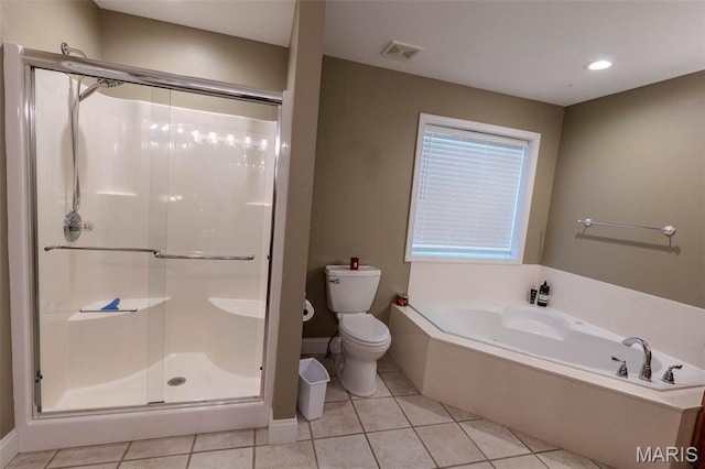 11782 Pine Forest Dr, Rolla, MO 65401 - bathroom with a shower stall, a bath, tile patterned flooring, and recessed lighting