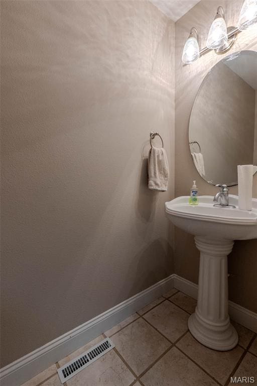 11782 Pine Forest Dr, Rolla, MO 65401 - bathroom featuring baseboards and tile patterned flooring