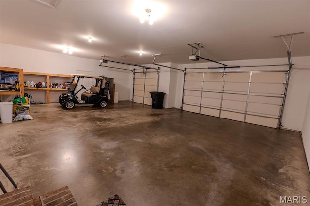 11782 Pine Forest Dr, Rolla, MO 65401 - garage featuring a garage door opener