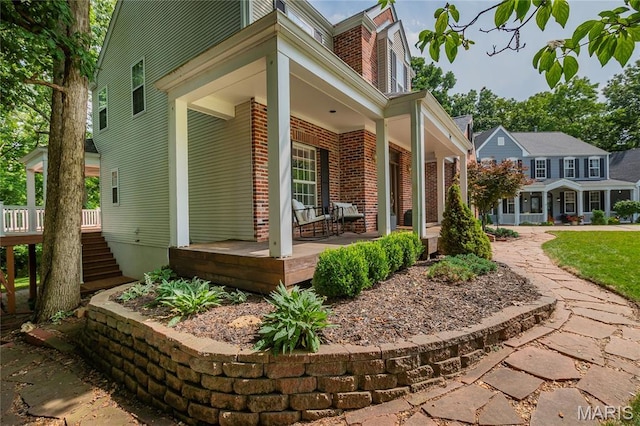 742 Arbor Ridge Ct, Ballwin, MO 63021 - view of side of property with a porch and brick siding