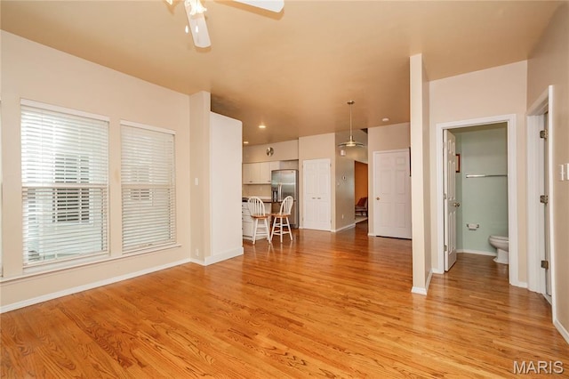 742 Arbor Ridge Ct, Ballwin, MO 63021 - living room with a ceiling fan and light wood-type flooring