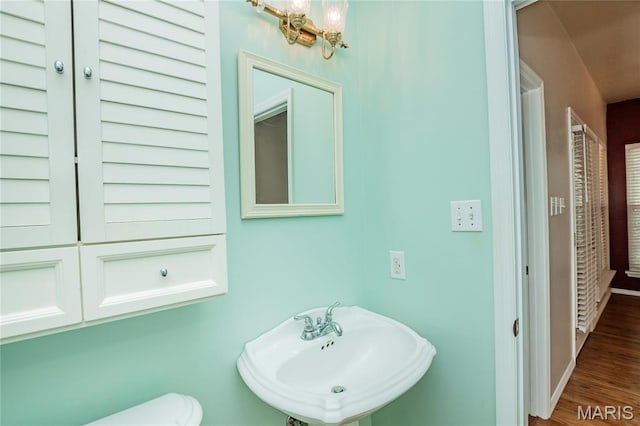 742 Arbor Ridge Ct, Ballwin, MO 63021 - bathroom with a sink and wood finished floors