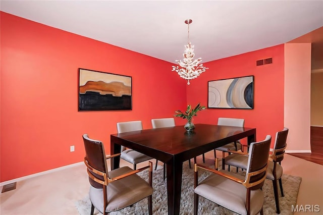 742 Arbor Ridge Ct, Ballwin, MO 63021 - dining space with a chandelier and baseboards