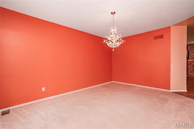 742 Arbor Ridge Ct, Ballwin, MO 63021 - unfurnished room featuring a chandelier and carpet flooring