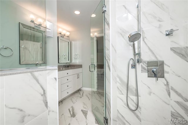 742 Arbor Ridge Ct, Ballwin, MO 63021 - full bath featuring a marble finish shower, vanity, recessed lighting, and marble finish flooring